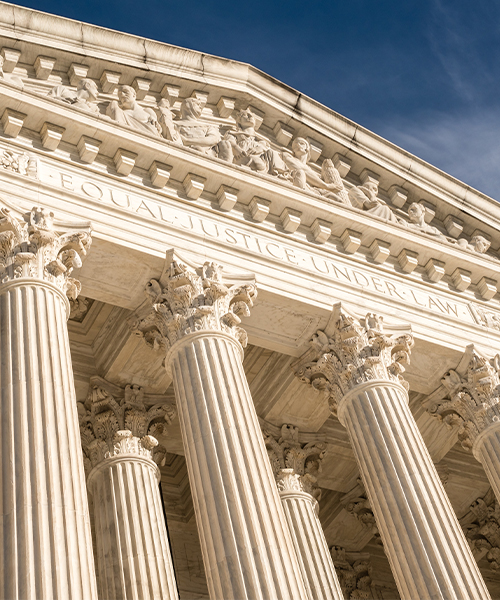 Supreme Court building facade with -Equal Justice Under Law- inscription