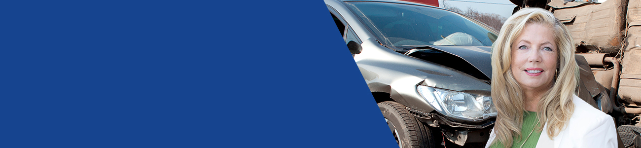 Banner photo of Gretchen Myers standing confidently in front of a car wreck